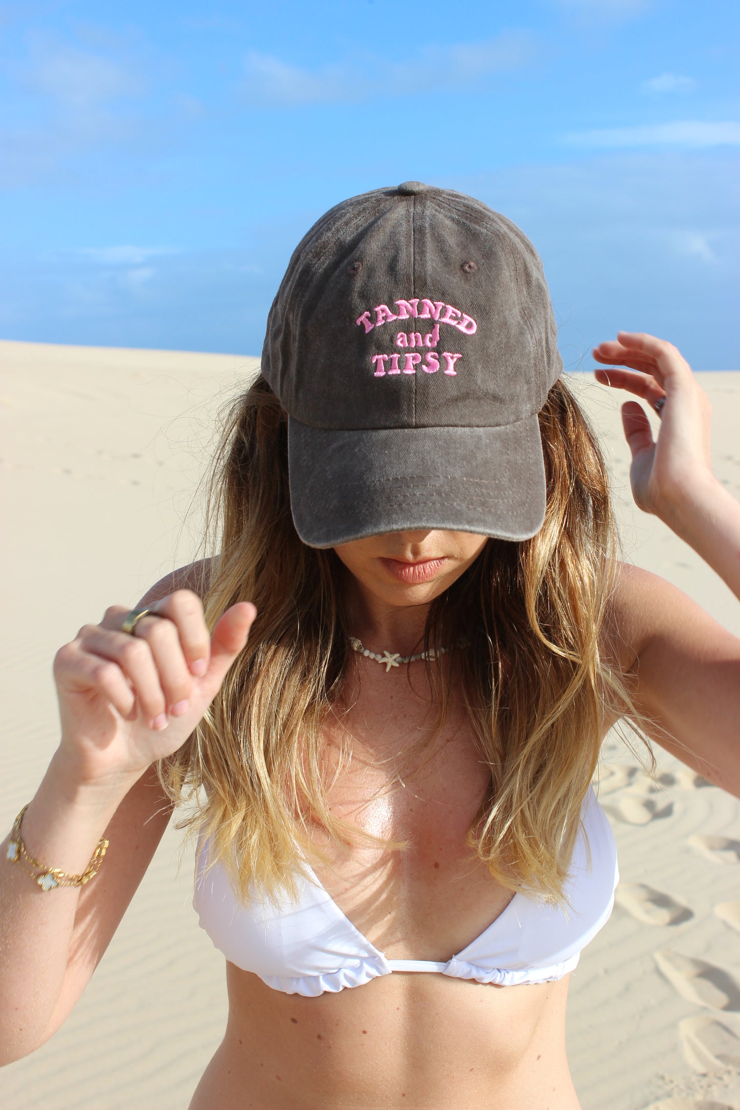 TANNED AND TIPSY CAP